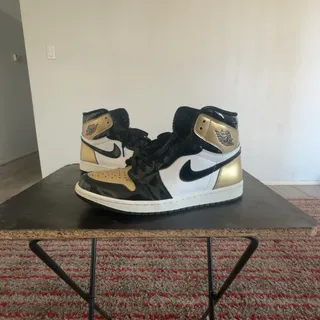Photo of Gold Toe air Jordan 1