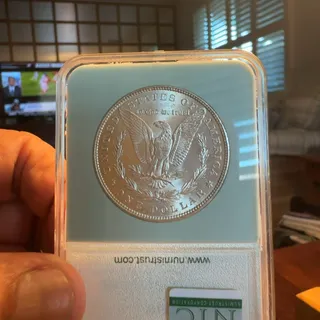 Photo of 1882 O Silver 90%, MS63 Silver dollar coin