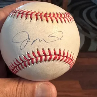 Photo of Joe Montana’s signature it’s authentic on a Major League Baseball used in game