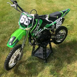Photo of 2004 Kawasaki KX65 2-stroke dirtbike.