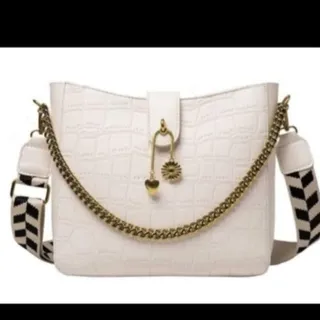 Photo of White bucket crossbody purse