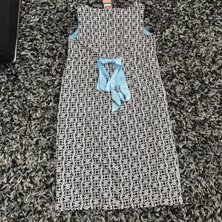 Photo of Avenue B&W Geometric Short Dress with Blue Bow on Back - 14