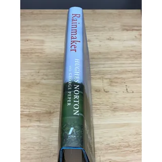 Photo of Rainmaker Hughes Norton George Peper 2024 First Edition Hardcover Golf Book