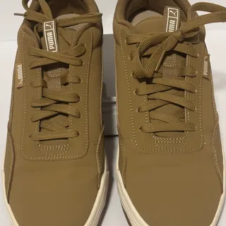 Photo of Puma men’s low top size 9 khaki color