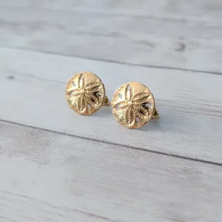 Photo of Vintage Napier Clip On Earrings Gold Tone Sand Dollar 0.75"
