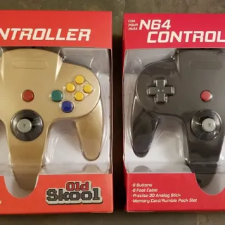 Photo of 2 N64 Controllers - Gold & Black (NEW) - Nintendo64
