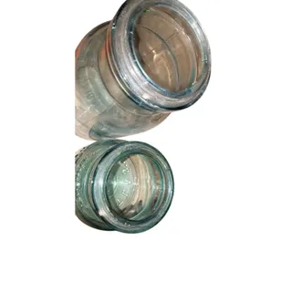 Photo of 2 aqua Atlas Ez Seal Jars missing bails 1 qt 1 squat pint Big one marked 5 on bottom Both Have rim chips but over all in good shape