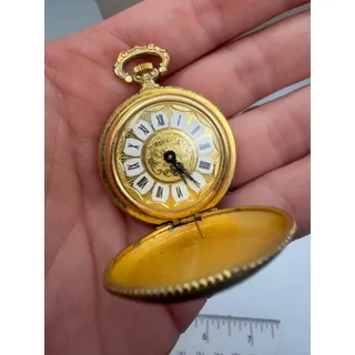 Photo of vintage Swiss-made mechanical pendant/pocket watch branded by Sidros
