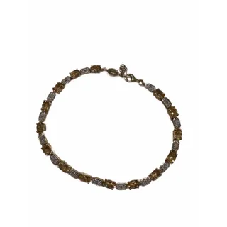 Photo of yellow citrine and diamond accent tennis bracelet in sterling silver with gold