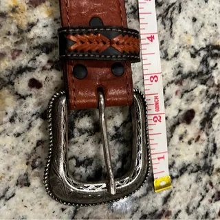 Photo of Vintage embossed leather and silver western cowgirl belt with buckle