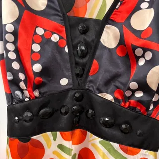Photo of Multi patterned indie tank top features