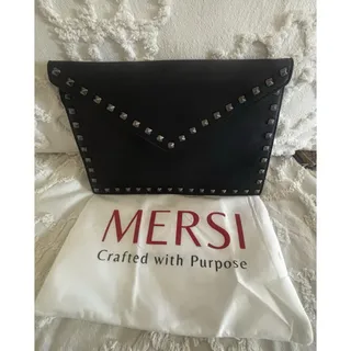 Photo of Sleek Black Studded Clutch/ Strap Option. Great Condition. Vegan W/Duster