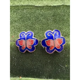 Photo of vintage cloisonné enamel earrings featuring a butterfly and floral clover design
