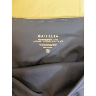 Photo of Athleta Navy Tennis Skirt Size XXS