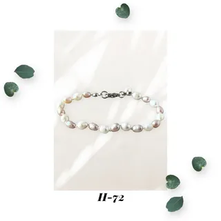 Photo of Mauve and White - Knotted Cultured Freshwater Pearl Bracelet - With Charm