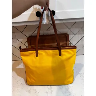 Photo of Michael Kors bright yellow Kempton nylon tote brown leather trim shoulder straps