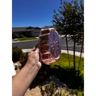 Photo of copper-tone aluminum oval Jell-O mold embossed floral sunburst pattern Vintage
