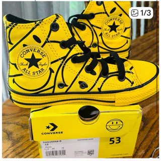 Photo of Chuck Taylor Smiley High Tops Youth Size 12. NIB RARE