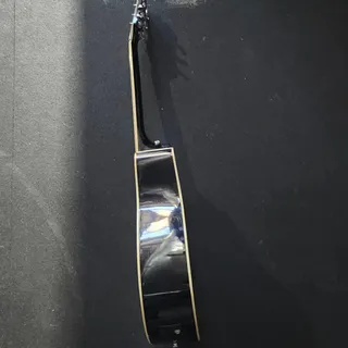 Photo of Urban Acoustic-Electric Sunburst Cutaway Guitar with Unique Inlays
