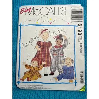 Photo of McCalls 6198 Sewing pattern toddler dress romper jumpsuit size 1 2 3 