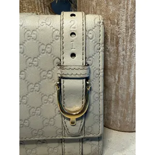 Photo of Gucci Microguccissima Leather Compact Trifold Wallet Cream White