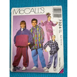 Photo of McCalls 7324 Sewing pattern Kids sweatsuit pullover quarter zip pants hoodie size 10 12 14