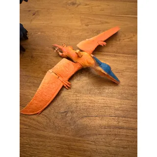 Photo of Fisher Price Imaginext Jurassic World Blue Raptor And orange flying Dino