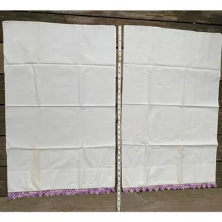 Photo of pillow case pair with crocheted trim purple