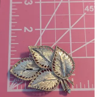 Photo of Vintage Signed BSK Gold Tone Four Leaf Textured Diamond Cut BROOCH
