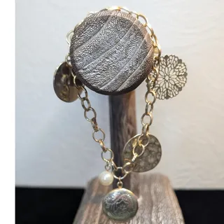 Photo of Vintage Gold Tone Charm Bracelet