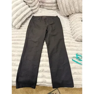 Photo of Lee Women’s brown and black houndstooth straight leg mid rise trousers.