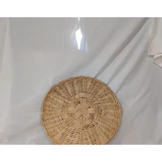 Photo of Round woven wicker wall basketwall