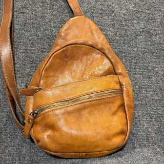 Photo of Vintage Brown Leather Sling Backpack Crossbody Bag Purse Travel Daypack Unisex