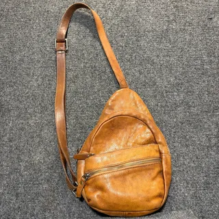 Photo of Vintage Brown Leather Sling Backpack Crossbody Bag Purse Travel Daypack Unisex