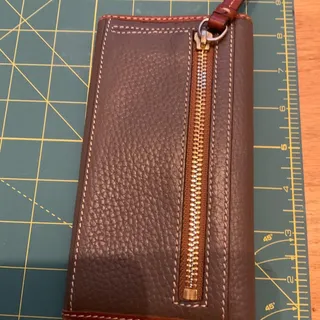 Photo of VINTAGE DOONEY & BOURKE CONTINENTAL CLUTCH