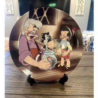 Photo of Vintage Disney Pinocchio Geppetto Workshop Collectable Plate Stand & Box 9.5"