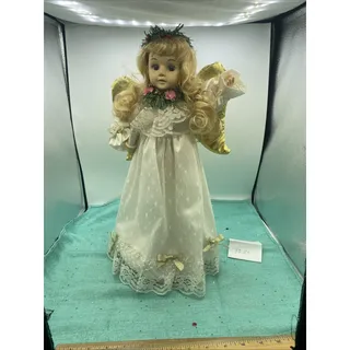 Photo of 17" HOLIDAY TRIM DOLL-ANGEL ILLUMINATED WITH MOVEMENT & PLAYS JINGLE BELLS WORKS