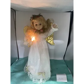 Photo of 17" HOLIDAY TRIM DOLL-ANGEL ILLUMINATED WITH MOVEMENT & PLAYS JINGLE BELLS WORKS