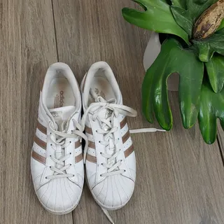 Photo of EUC Adidas Superstar originals  sz7  white and gold sneakers