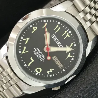 Photo of Vintage 1990 Seiko Automatic Mens Silver Watch W/daydate & White accents