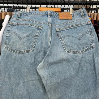 Photo of Vintage 1996 Levis 550 With Perfect Fade And Great Wear In A Light Denim Color