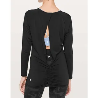 Photo of Lululemon Deep Stretch Cinch Back Long Sleeve Top Size 6 Black Athletic Fitness