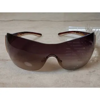Photo of Y2K Vintage Prada SPR 54G Tortoiseshell Shield Sunglasses – Gold 5AK-2Z1