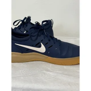 Photo of Nike Men’s Navy and White Sneakers with Gum Sole