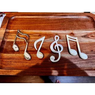 Photo of vintage 3 opalescent music notes 1 gold Christmas ornament signed 1989 Americana