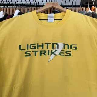 Photo of Vintage Y2K Lightning Strikes Distressed Tee Yellow