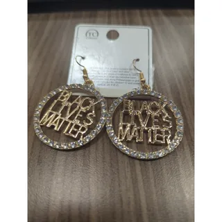 Photo of Gold Black Lives Matter earrings with white rhinestones 
