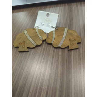 Photo of Wooden lady face shaped earrings with gold head band