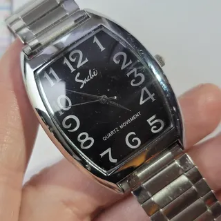Photo of Vintage Suede Womens Watch Black Dial Silver Case Bracelet Tonneau Quartz