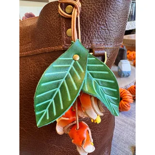 Photo of Genuine Leather Green Leaf Orange Flower Purse Charm Leather Bag Charm